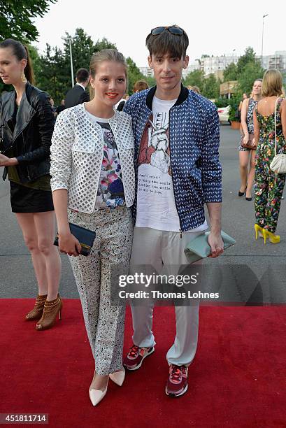 Jella Haase and designer Kilian Kerner arrive for the Opening Night by Grazia fashion show during the Mercedes-Benz Fashion Week Spring/Summer 2015...