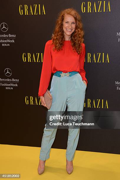 Chiara Schoras arrives for the Opening Night by Grazia fashion show during the Mercedes-Benz Fashion Week Spring/Summer 2015 at Erika Hess Eisstadion...