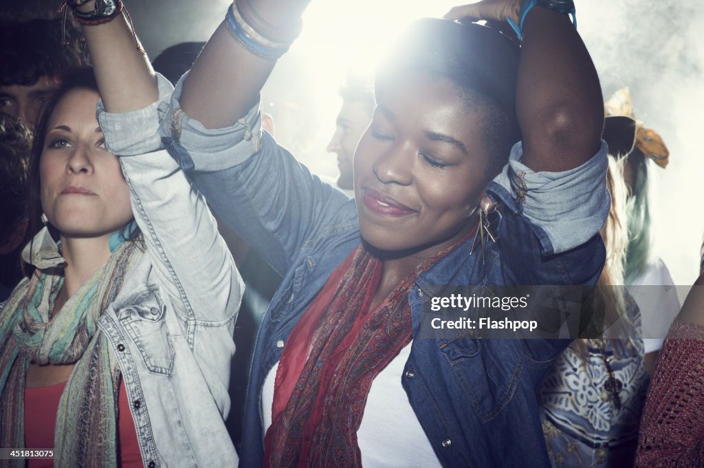 Group of people having fun at music concert