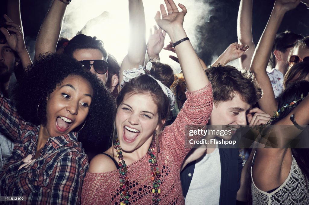 Group of people having fun at music concert