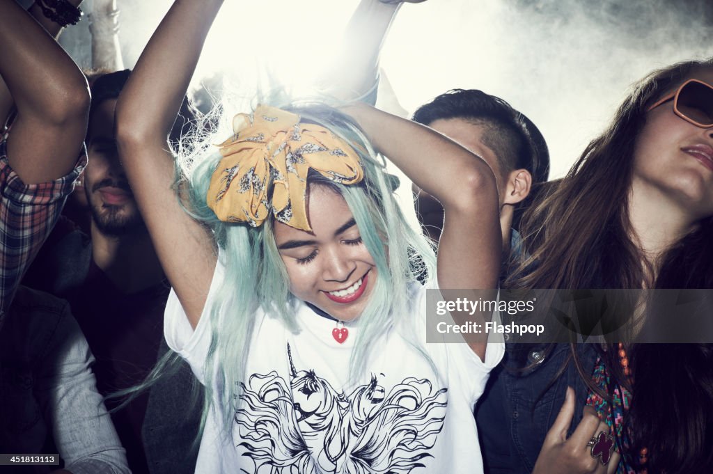 Group of people having fun at music concert