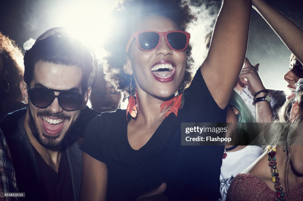 Group of people having fun at music concert