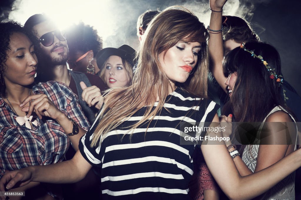 Group of people having fun at music concert