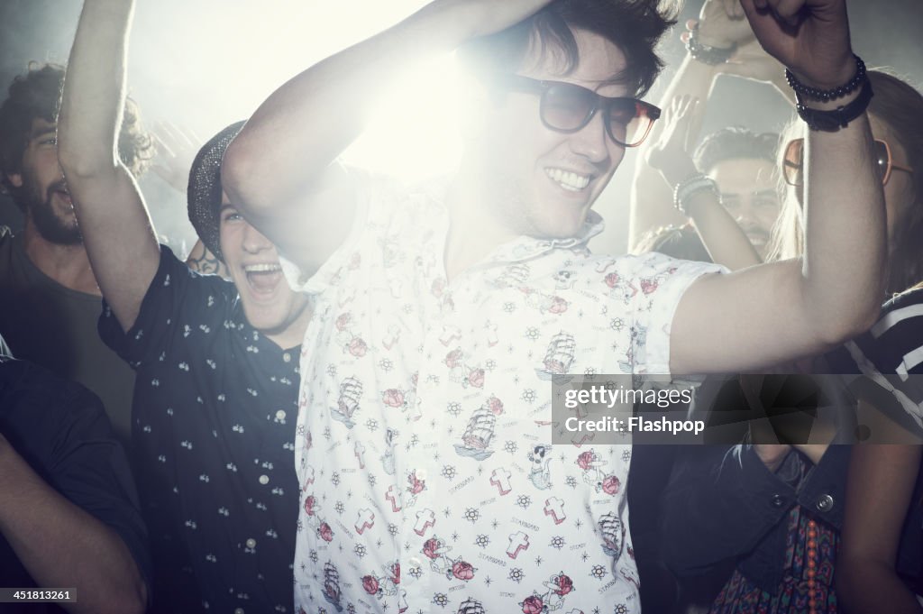 Group of people having fun at music concert