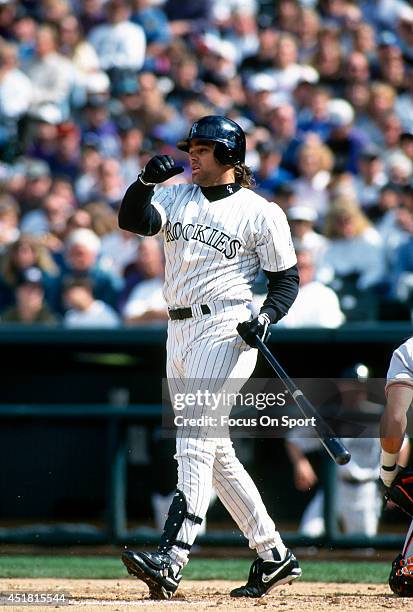 Dante Bichette of the Colorado Rockies bats during an Major League Baseball game circa 1995 at Coors Field in Denver, Colorado. Bichette played for...