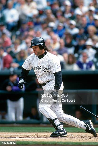 Dante Bichette of the Colorado Rockies bats during an Major League Baseball game circa 1995 at Coors Field in Denver, Colorado. Bichette played for...