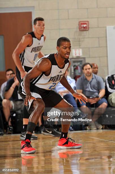 Kim English of the Orlando Magic defends against the Houston Rockets during the Samsung NBA Summer League 2014 on July 7, 2014 at Amway Center in...