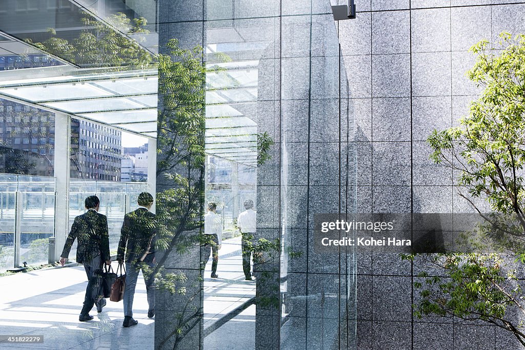 Business men in office building