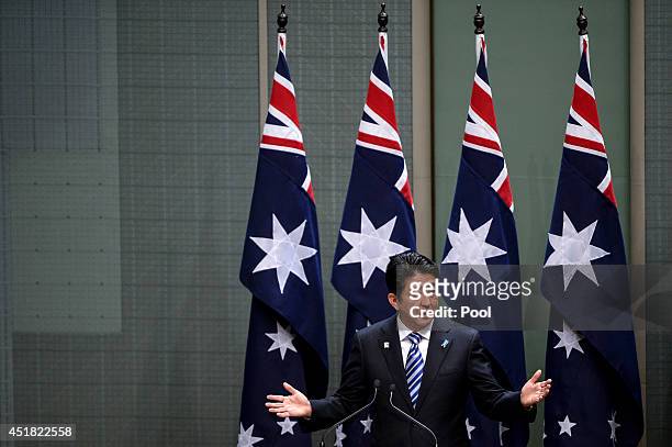 Japanese Prime Minister Shinzo Abe delivers an address to Members and Senators of the Parliament of Australia at Parliament House on July 8, 2014 in...