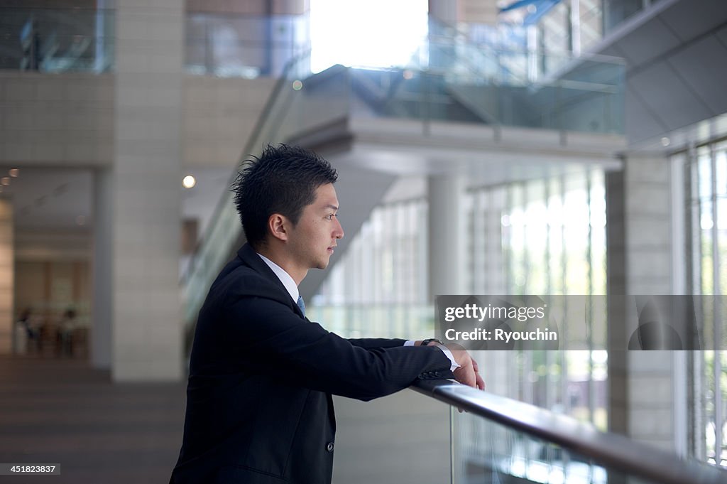 The businessman who thinks in an office building