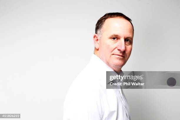 New Zealand Prime Minister John Key poses during a portrait session at Minnie St Studios on July 8, 2014 in Auckland, New Zealand. John Key is the...