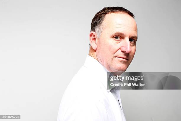 New Zealand Prime Minister John Key poses during a portrait session at Minnie St Studios on July 8, 2014 in Auckland, New Zealand. John Key is the...