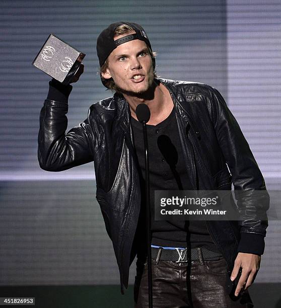 Musician Avicii accepts the Favorite Electronic Dance Music Artist award onstage during the 2013 American Music Awards at Nokia Theatre L.A. Live on...