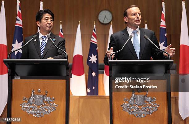 Japanese Prime Minister Shinzo Abe addresses the Australian Government in the House of Representatives with Australian Prime Minister Tony Abbott at...