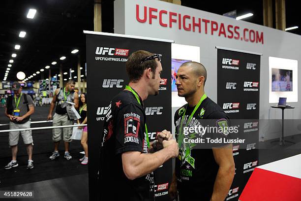 Mixed martial artist Cub Swanson stares down a fan during the UFC Fan Expo 2014 during UFC International Fight Week at the Mandalay Bay Convention...