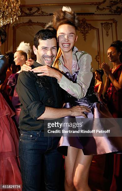 Fashion designer Alexis Mabille and a model attend the Alexis Mabille show as part of Paris Fashion Week - Haute Couture Fall/Winter 2014-2015 on...