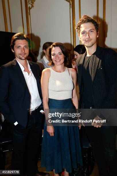 Members of group "Something's Fishy" Raphael Personnaz and Audrey Ismael, Simon Buret attend the Alexis Mabille show as part of Paris Fashion Week -...