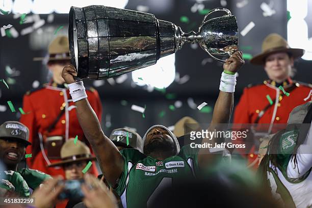 Quarterback Darian Durant of the Saskatchewan Roughriders hoists the Grey Cup following their 45-23 victory over the Hamilton Tiger-Cats during the...