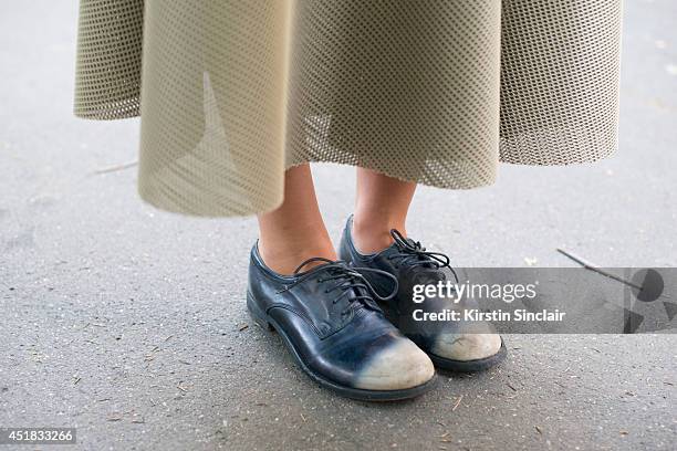 Fashion Student Elisa Carassai wears a Samuji skirt and offiicine creative shoes day 1 of Paris Haute Couture Fashion Week Autumn/Winter 2014, on...