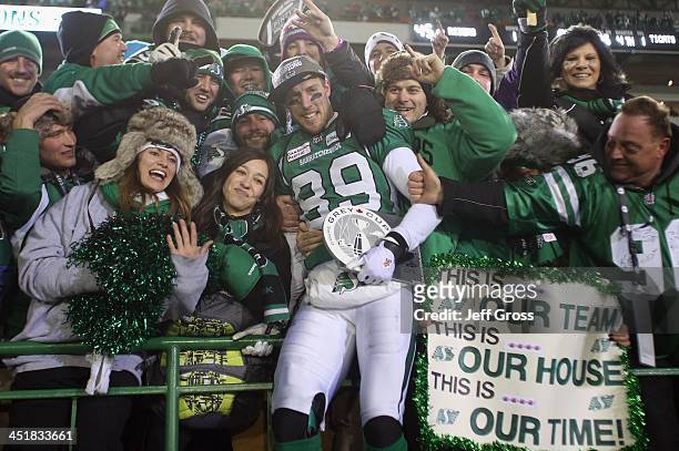 Wide receiver Chris Getzlaf of the Saskatchewan Roughriders celebrates with fans following his teams 45-23 victory over the Hamilton Tiger-Cats...