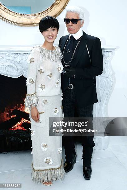 Fashion designer Karl Lagerfeld and Kwai Lun-Mei pose backstage after the Chanel show as part of Paris Fashion Week Haute Couture Fall/Winter...