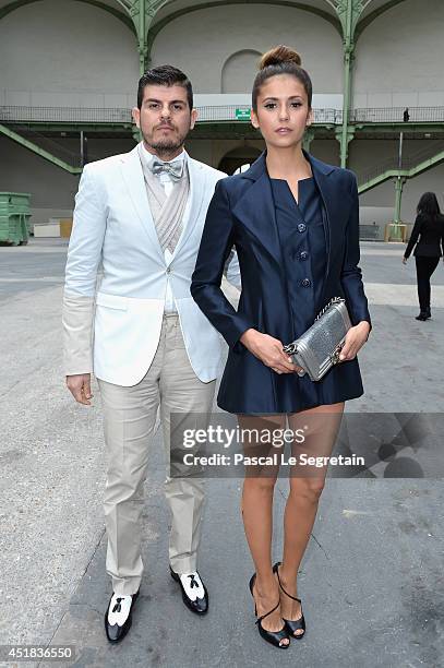 Eli Mizrahi and Nina Dobrev attend the Chanel show as part of Paris Fashion Week - Haute Couture Fall/Winter 2014-2015 at Grand Palais on July 8,...