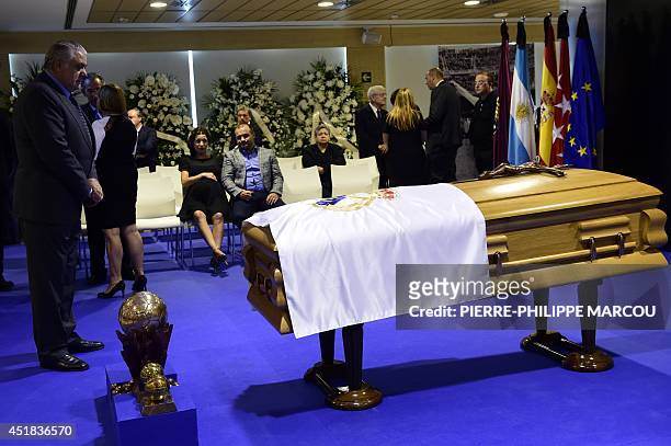 Former Real Madrid's president Lorenzo Sanz looks at the coffin of late Real Madrid's honorary president Alfredo di Stefano at the Santiago Bernabeu...