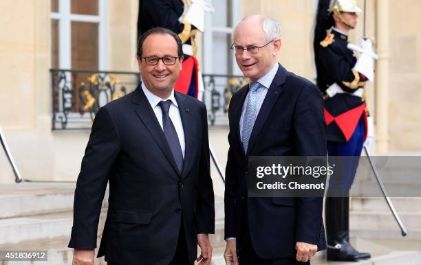 French President Francois Hollande welcomes European Council President Herman Van Rompuy prior a meeting at the Elysee Palace on July 8, 2014 in...