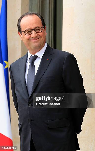 French President Francois Hollande waits before a meeting with European Council President Herman Van Rompuy at the Elysee Palace on July 8, 2014 in...