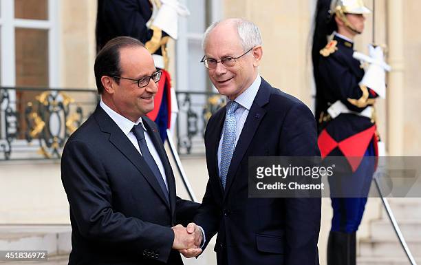 French President Francois Hollande welcomes European Council President Herman Van Rompuy prior a meeting at the Elysee Palace on July 8, 2014 in...