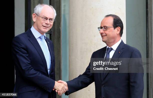 French President Francois Hollande welcomes European Council President Herman Van Rompuy prior a meeting at the Elysee Palace on July 8, 2014 in...