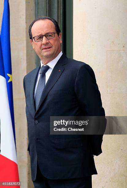 French President Francois Hollande waits before a meeting with European Council President Herman Van Rompuy at the Elysee Palace on July 8, 2014 in...