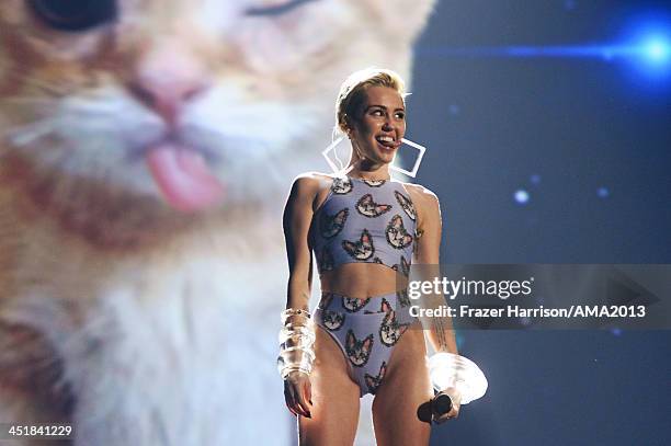 Singer Miley Cyrus performs onstage during the 2013 American Music Awards at Nokia Theatre L.A. Live on November 24, 2013 in Los Angeles, California.