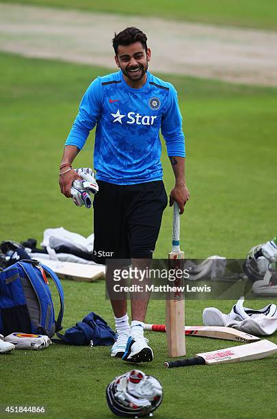 Virat Kohli of India looks on during a India nets session ahead of the first Investec Test Series at Trent Bridge on July 8, 2014 in Nottingham,...