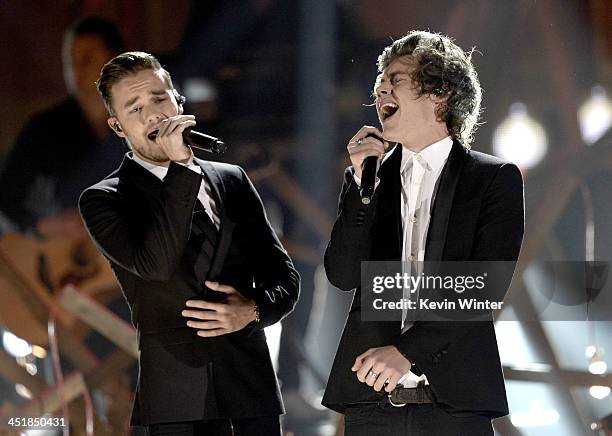 Singers Liam Payne and Harry Styles of One Direction perform onstage during the 2013 American Music Awards at Nokia Theatre L.A. Live on November 24,...
