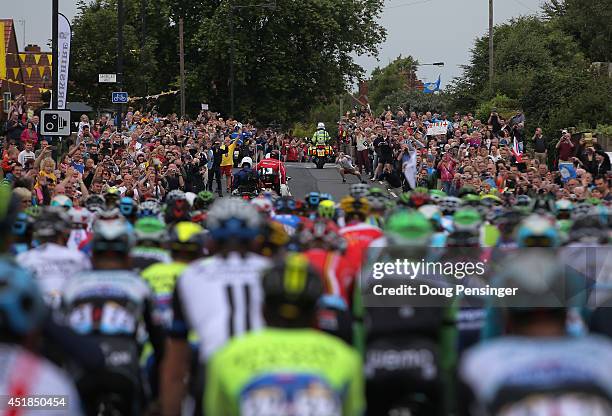 The peloton rides into a sea of fans as they start stage two of the 2014 Le Tour de France from York to Sheffield on July 6, 2014 in York, United...