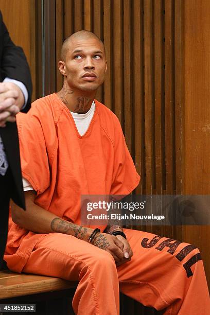 Jeremy Meeks, right, makes a court appearance with his attorney Tai Bogan July 8, 2014 in Stockton, California. During his brief appearance the state...