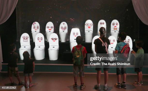 Visitors during the 'Toilet!? Human Waste and Earth's Future' exhibition at The National Museum of Emerging Science and Innovation - Miraikan on July...