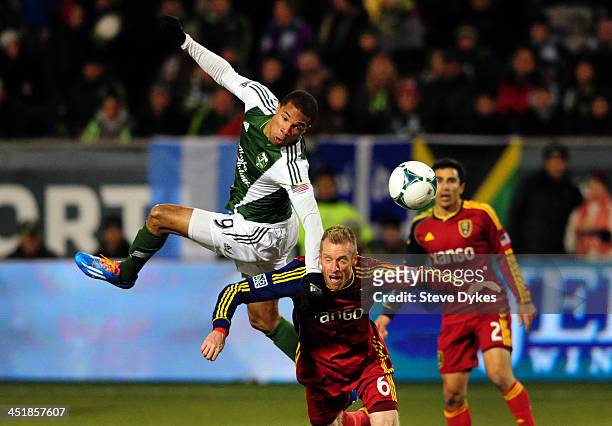 Ryan Johnson of Portland Timbers and Nat Borchers of Real Salt Lake go up for a ball during the second half of the game at Jeld-Wen Field on November...