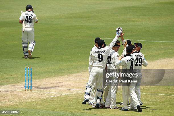 The Warriors celebrates the wicket of Dan Christian of the Bushrangers during day four of the Sheffield Shield match between the Western Australia...