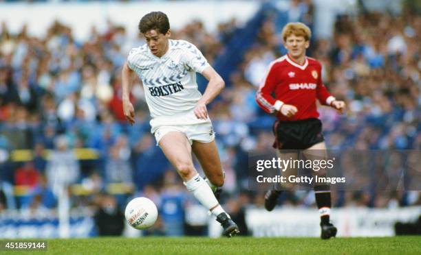 Tottenham Hotspur winger Chris Waddle in action as Gordon Strachan looks on during the League Division One match between Tottenham Hotspur and...