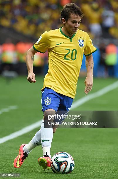 Brazil's forward Bernard controls the ball during the semi-final football match between Brazil and Germany at The Mineirao Stadium in Belo Horizonte...