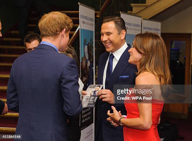 Prince Harry meets David Walliams and Natalie Pinkham at the Business in the Community 2014 Responsible Business Awards Gala Dinner at the Royal...