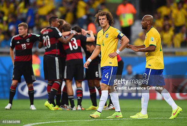 David Luiz and Maicon of Brazil react after allowing a goal during the 2014 FIFA World Cup Brazil Semi Final match between Brazil and Germany at...