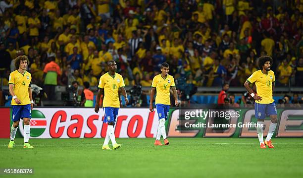 David Luiz, Ramires, Luiz Gustavo and Dante of Brazil look dejected after allowing a goal braduring the 2014 FIFA World Cup Brazil Semi Final match...