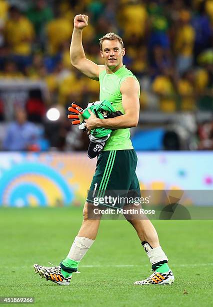 Goalkeeper Manuel Neuer of Germany celebrates after defeating Brazil 7-1 during the 2014 FIFA World Cup Brazil Semi Final match between Brazil and...