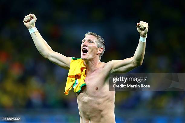 Bastian Schweinsteiger of Germany acknowledges the fans after a 7-1 victory during the 2014 FIFA World Cup Brazil Semi Final match between Brazil and...