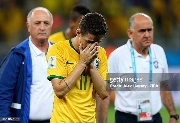 Oscar of Brazil shows his dejection after the 1-7 defeat in the 2014 FIFA World Cup Brazil Semi Final match between Brazil and Germany at Estadio...
