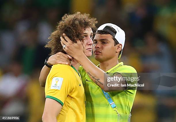 Distraught David Luiz with Thiago Silva during the 2014 FIFA World Cup Brazil Semi Final match between Brazil and Germany at The Estadio Mineirao on...