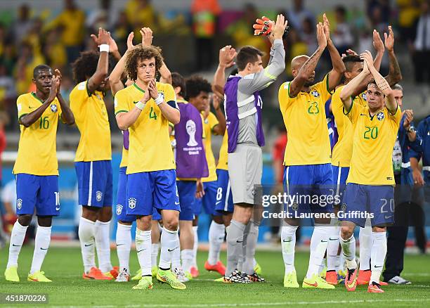 Brazil players acknowledge the fans after a 7-1 defeat to Germany during the 2014 FIFA World Cup Brazil Semi Final match between Brazil and Germany...